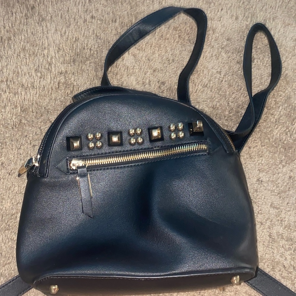 Steve Madden, black studded backpack.